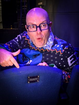 David Phipps-Davis with his named seat.