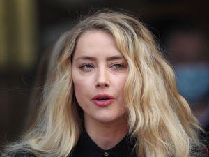 Supporting image for story: Amber Heard: The things I have been through are not going to stop my career