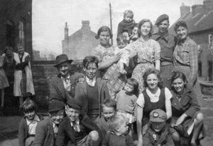 Celebrating the end of the war at 'The Sump' in Oakengates, around Vicar Street and Church Street, was Jean Edwards, second row, second from right and her friends
