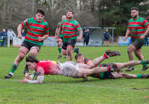 Benedict Mason scores a try for Whitchurch.