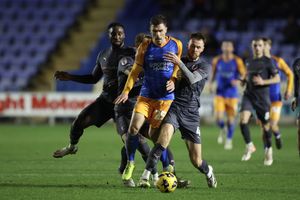 Josh Ruffels of Shrewsbury Town and Tom Naylor of Chesterfield