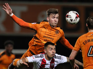 Supporting image for story: Lee Evans handles the Wolves pressure
