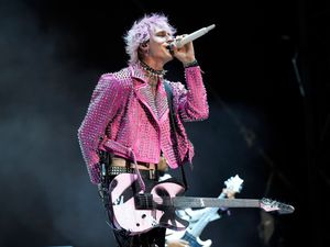 Supporting image for story: Machine Gun Kelly responds to vandal who defaced his tour bus