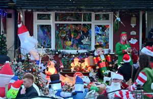 Tommy can just been seen watching in the window.