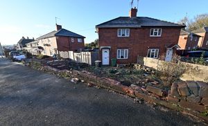 The wall of the property was severely damaged, with residents being left to pick up the pieces