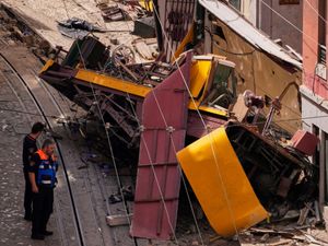 Supporting image for story: Investigators search for cause of Lisbon funicular crash that killed 16