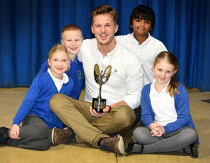 Jake Coates with pupils Ilka Wilkinson, 7, Oliver Hickman, 7, Arjun Chakkravarthy, 7 and Megan Mitchell, 8