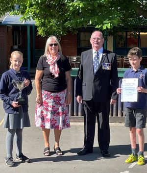 Ann Whitfield and Tim Armstrong with Arthur Pugh, vice chair of the school council, and Sophie Fallon, chair