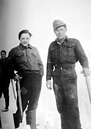 Godfrey Sittig, left, clearing snowdrifts near Cannock in 1947.
