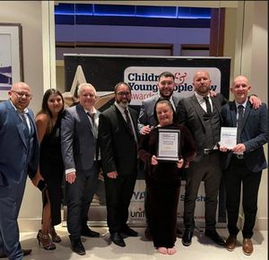 The partnership team accept their award. Photo: West Midlands Police