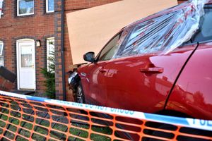 TELFORD  COPYRIGHT Mike Sheridan - A car crashes into a house at Cyril Hayward Court in Hadley, Telford on Sunday, July 13, 2025
