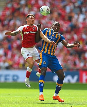 Omar Beckles tussles for the ball (AMA)