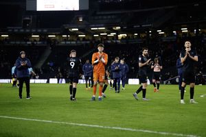 Salop players applaud the travelling support 