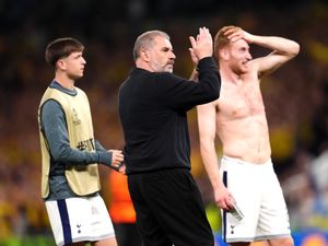 Dejan Kulusevski (right) and Ange Postecoglou celebrate after Tottenham's win over Bodo/Glimt