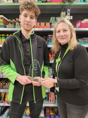 Asda worker Alfie has been hailed with an award