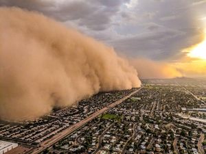 Supporting image for story: Aerial photographer explains the dangers of capturing a dust storm from above