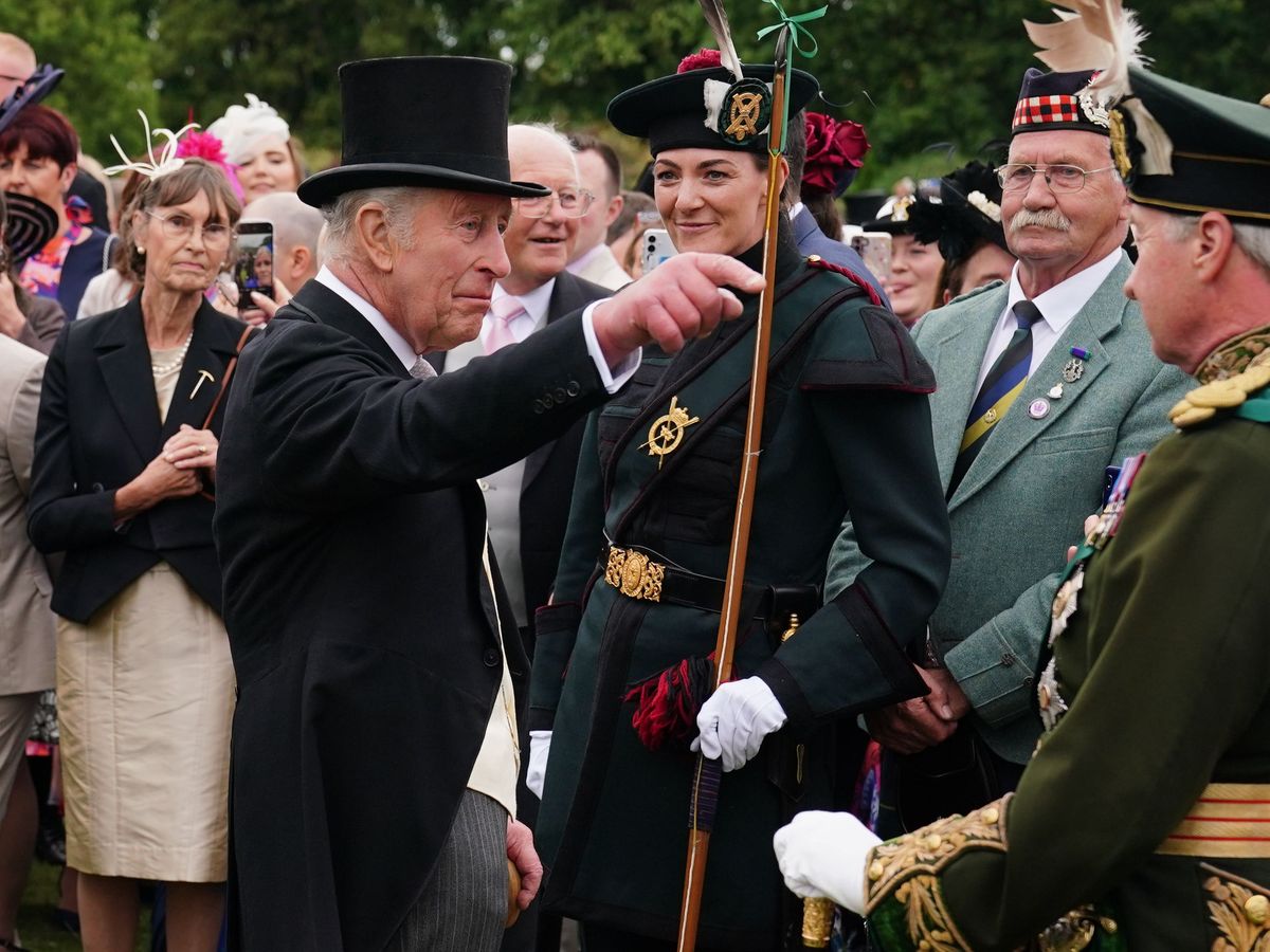 King and Queen begin Holyrood Week under guard of ceremonial female bodyguards