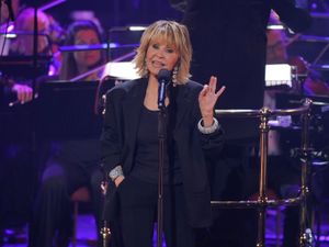 Lulu performing on stage