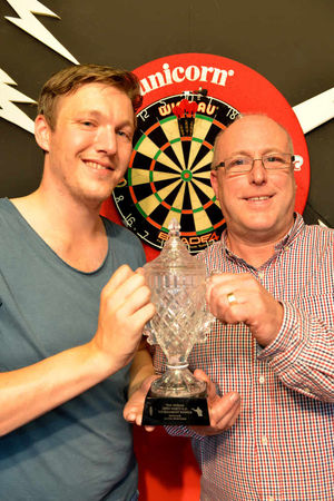 In the money - David Pallett is presented with the top prize at the West Midlands Open by organiser Bob Shaw.
