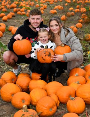 Stephen Mills, Leah Groucott and Flora Mills, four. Photo: Tim Thursfield