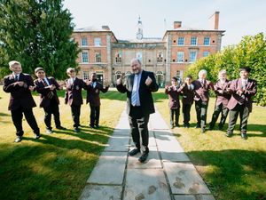 Don and students when he returned to Haberdashers' Adams Grammar School as a milloinaire