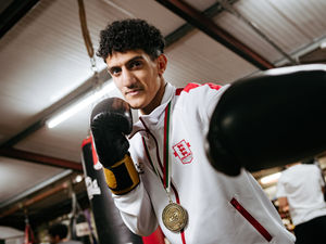 Supporting image for story: Halesowen's Osama Mohamed in a rush as he powers to a quick-fire victory