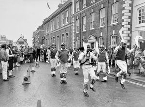 'The South Shropshire Morris Dancers, who gave displays throughout the district on Saturday, brave the showers at Northgate, Bridgnorth.' The picture was taken on June 2, 1979.