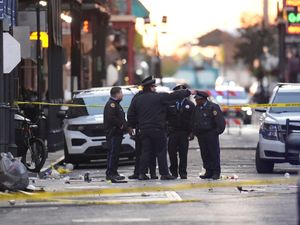 Supporting image for story: 10 dead, 30 injured after car ploughs into crowd in New Orleans