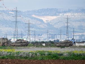 Israeli tanks gather outside of the occupied West Bank near Jenin