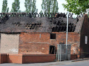 Supporting image for story: Fire hits former tyre garage