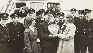 Members of Albrighton Wives Club presented a shield to Albrighton Fire Service to show appreciation of their work. The photograph includes Linda Hodgkiss, Doug Head and Dorothy Mack.