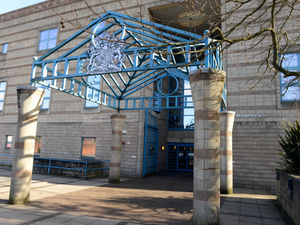 Supporting image for story: Man jailed after walking down street armed with gun and dressed in camouflage clothing 