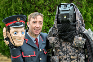 Walsall Dr Who creature actor Richard Price with two of the costumes he appeared in during the filming of the show and has now purchased via the Children in Need auction for his own collection. Pictured is the 'Kerblam Postman' and a 'Sniperbot'. Photo credit: Tim Sturgess