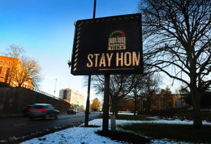 Road signs in Wolverhampton, which are supposed to read 'stay home'