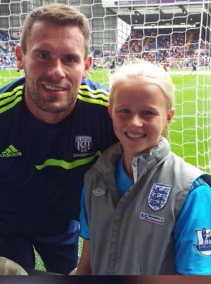 A young Hannah Hampton with former West Brom goalkeeper Ben Foster.