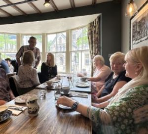 Volunteers from County Hospital and St Georges hospital are joined by trustees for their afternoon tea.