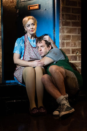 Vivienne Carlyle as Mrs Johnstone and Sean Jones as Mickey.