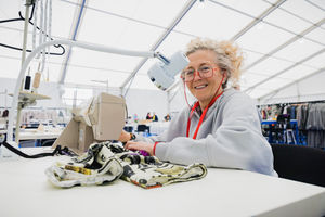 A volunteer makes costumes for the Birmingham 2022 Opening Ceremony