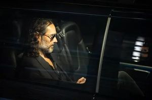 Russell Brand leaves the Troubadour Wembley Park theatre in north-west London after performing a comedy set as he faces allegations of sexual assault (James Manning/PA)