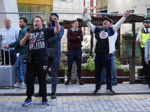 Supporting image for story: Police officer punched in face at anti-asylum protest in London