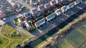 An aerial view of the canal, which has no fencing and is metres away from homes