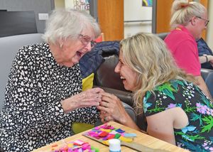 Lisa Cowley shares a laugh with Doris Birch