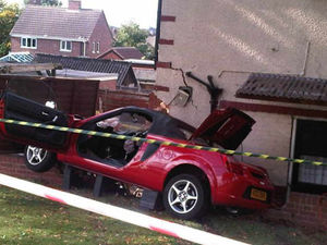 Supporting image for story: Car smashes into kitchen of house