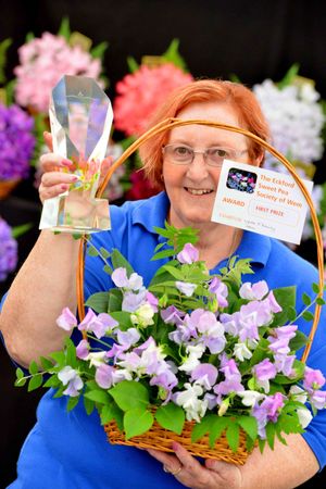 Lynda O'Riahilly of Wem with her Gregory Snary Memorial Perpetual Trophy that she won for her basket