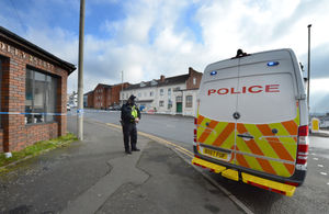 Police at the scene in Queens Cross, Dudley, where Mr Zeb was shot