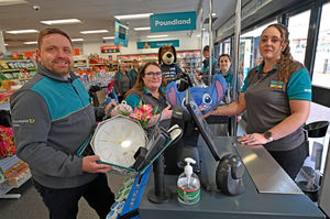 Cannock Poundland revealed the results of its makeover on Saturday. Workers have been on site over the past two weeks to prepare the store with a new look. Pictured left is manager Ian Hogg with staff looking on