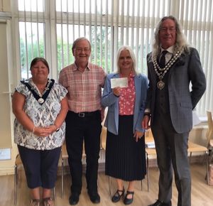 Helen and Ed from Llandrindod Wells Twinning Association with Llandrindod Wells' Mayor and Deputy Mayor
