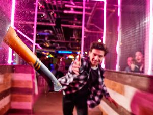 Supporting image for story: Axe-throwing and escape room firm warns on profits amid consumer weakness