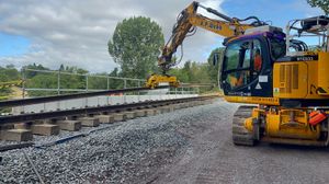 Lifting a rail into position. Picture: Steve Featherstone