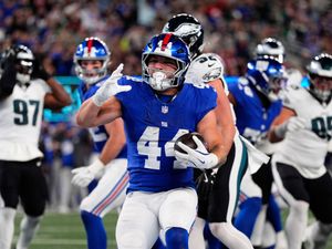Supporting image for story: Cam Skattebo scores three touchdowns as New York Giants stun champions